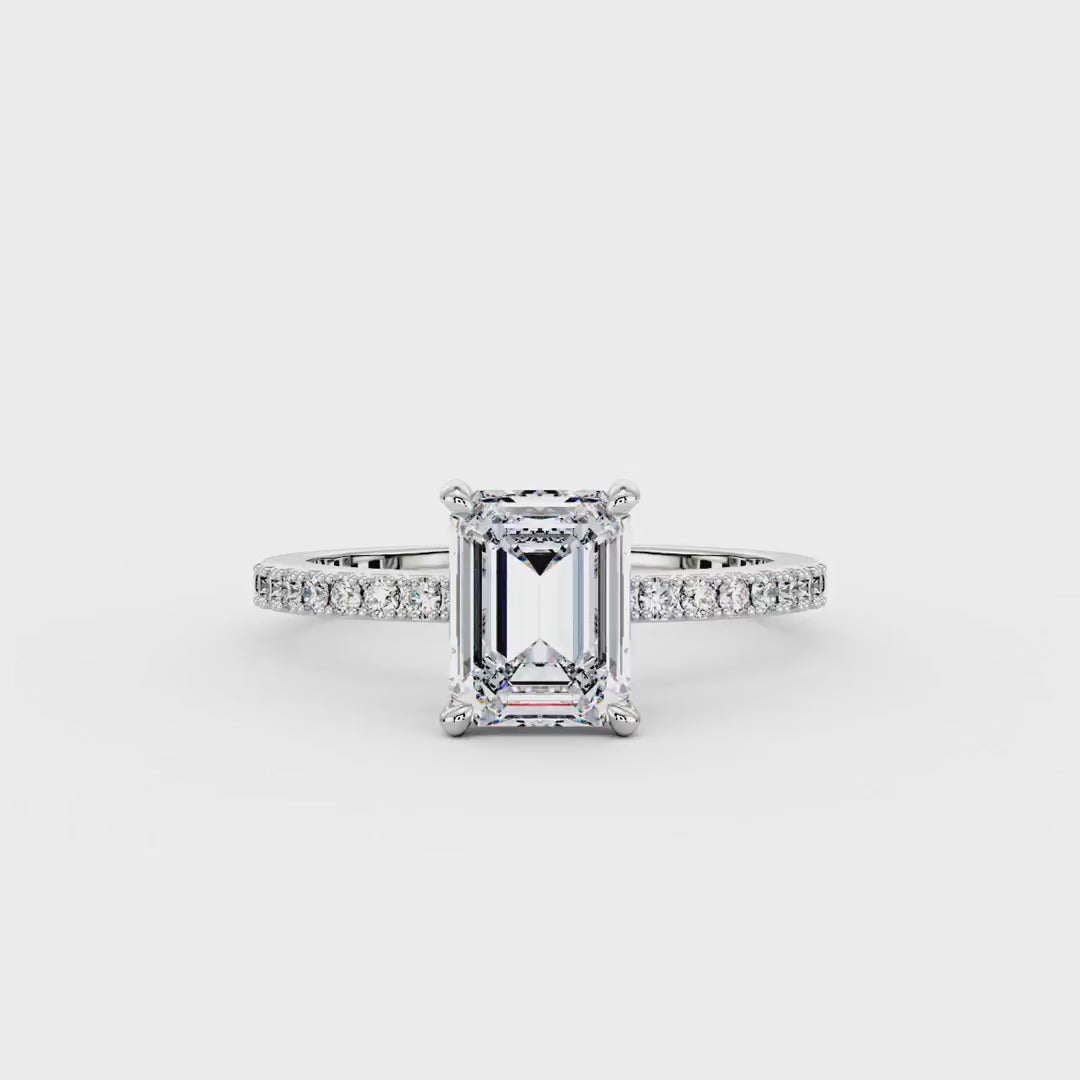 Emerald Hidden Halo Ring With Pavé Band