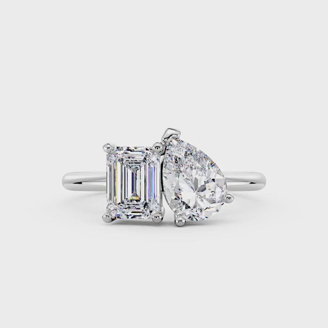 Emerald and Pear Moissanite Toi et Moi Ring