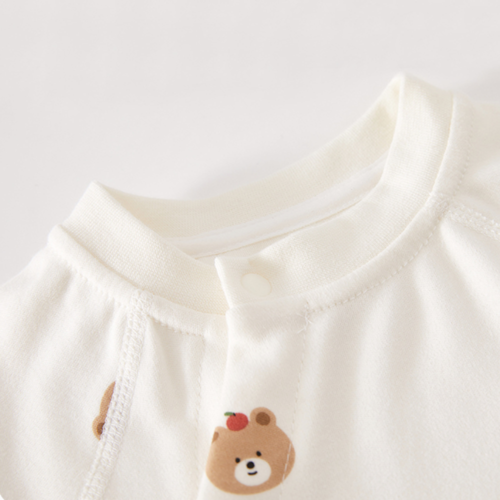 Barboteuse bébé en coton imprimé animal avec fermeture à pression