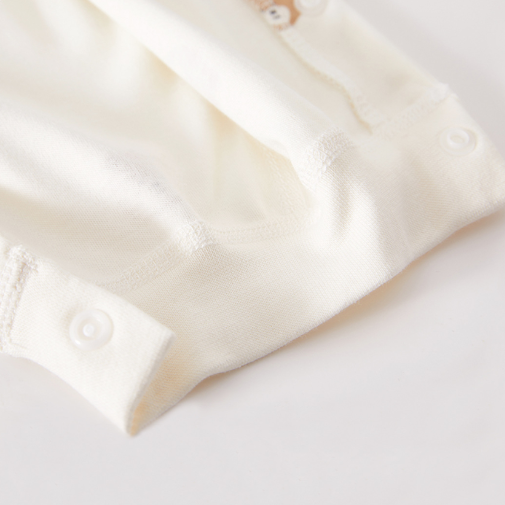 Barboteuse bébé en coton imprimé animal avec fermeture à pression