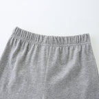 Ensemble T-shirt et short dinosaure sauvage