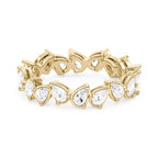 Alliance sertie d'une moissanite poire irrégulière